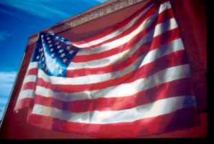 American flag painted eight stories high
        Image © Frederick Monsimer